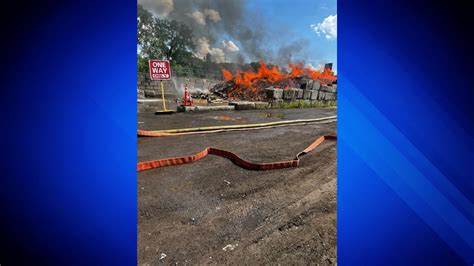 Fire crews battle multi-alarm blaze in Hyde Park salvage yard
